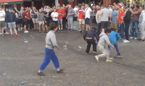 England fans mock child beggars