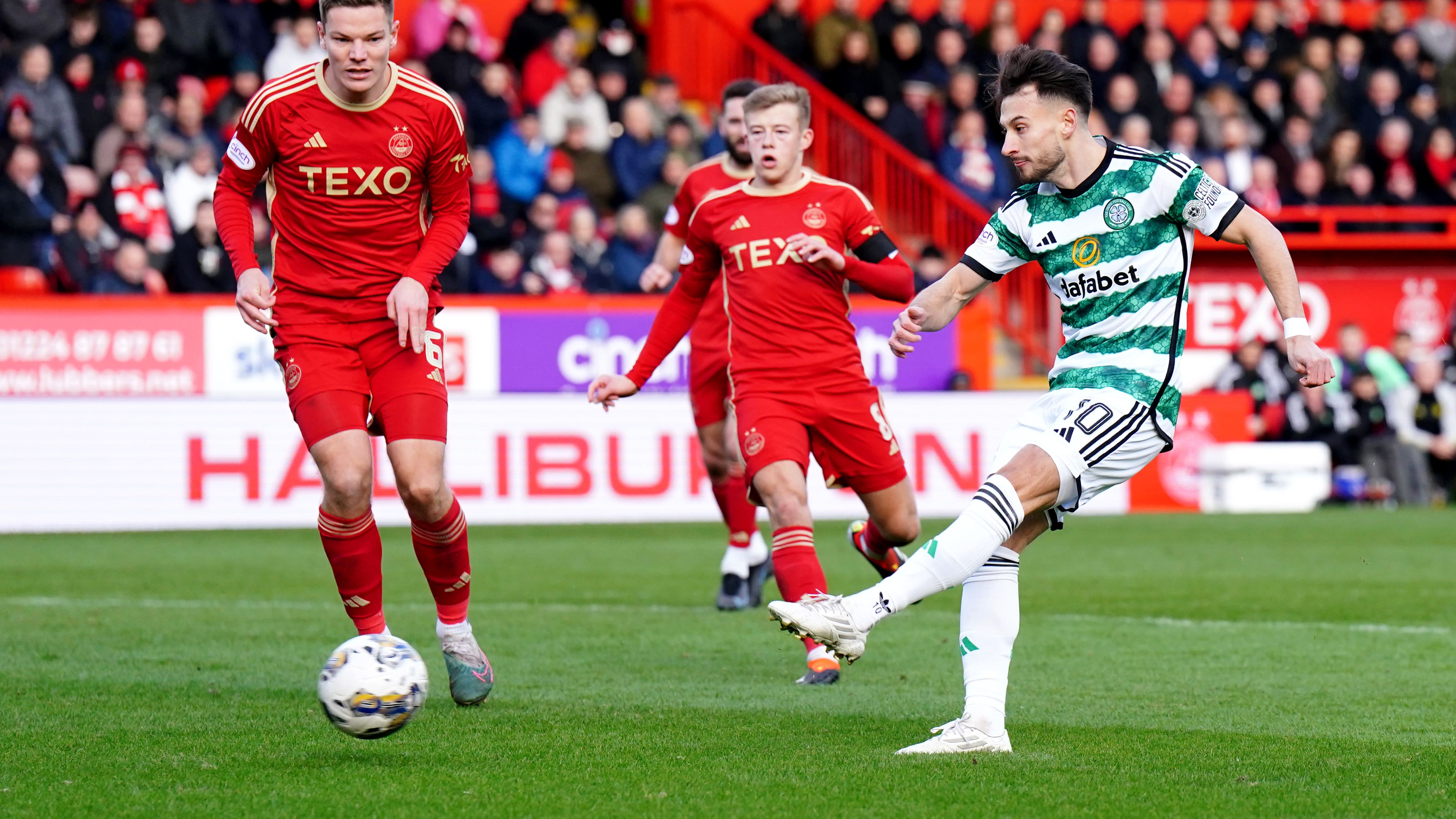 New signing Kuhn rescues point for Celtic as fans protest at transfer business