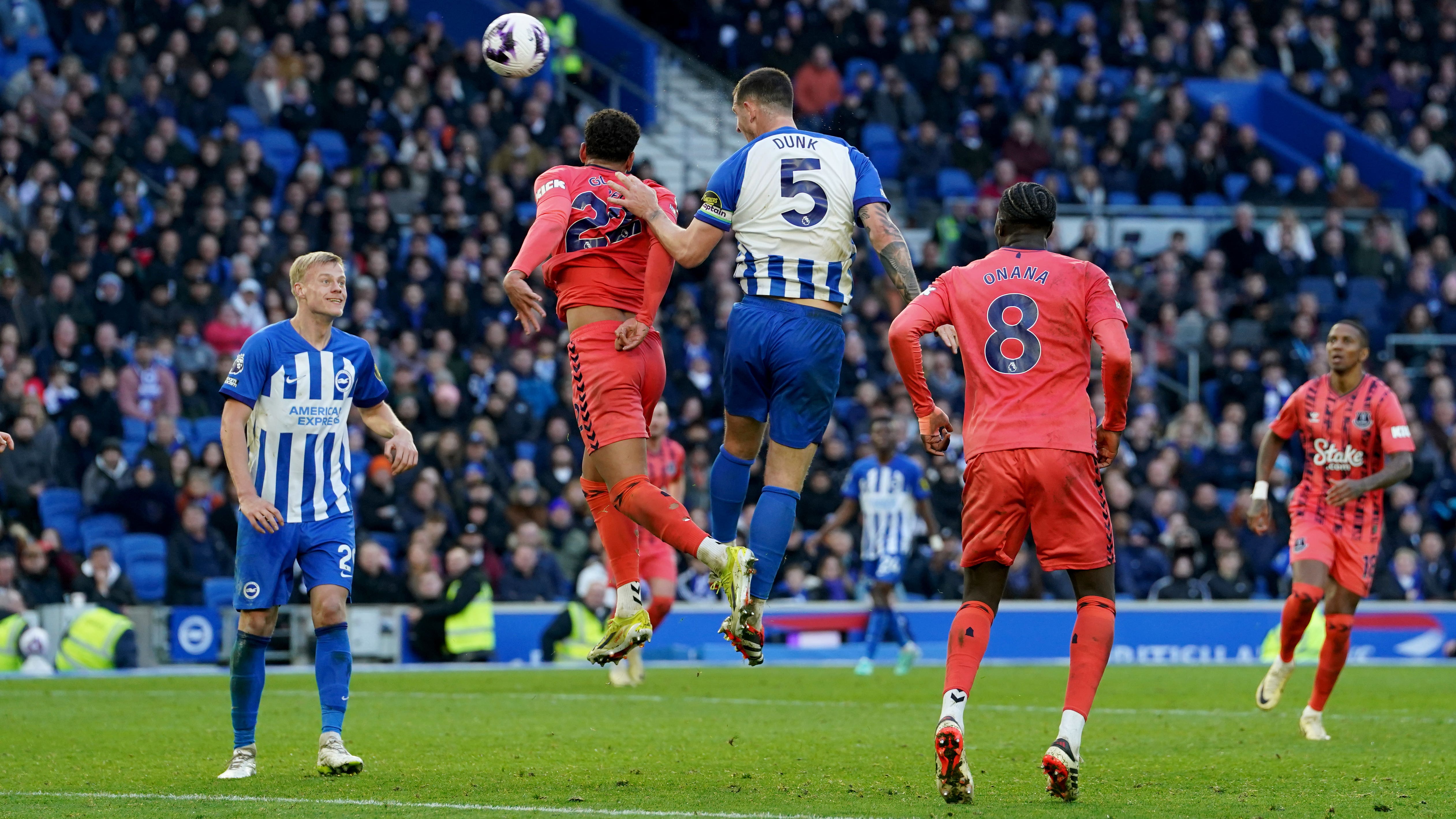 Lewis Dunk’s last-gasp leveller earns 10-man Brighton draw with Everton