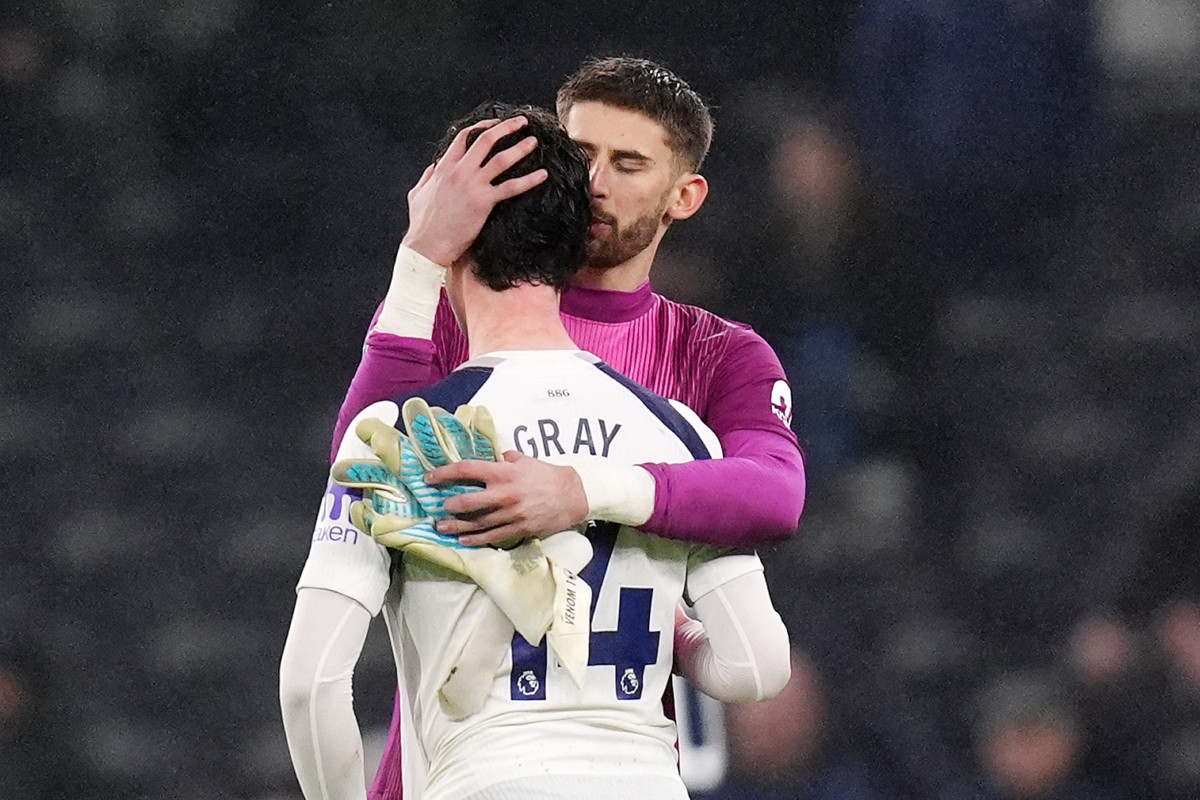 Tottenham Hotspur goalkeeper Guglielmo Vicario and Archie Gray embrace after the Newcastle defeat
