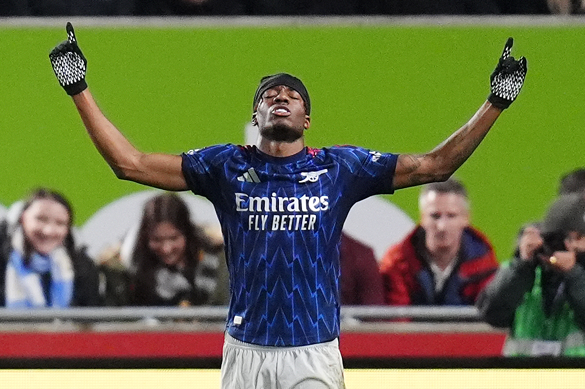 Noni Madueke celebrates after he opened the scoring 