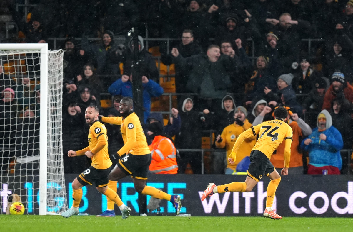 Tom Edozie celebrates after Wolves draw level