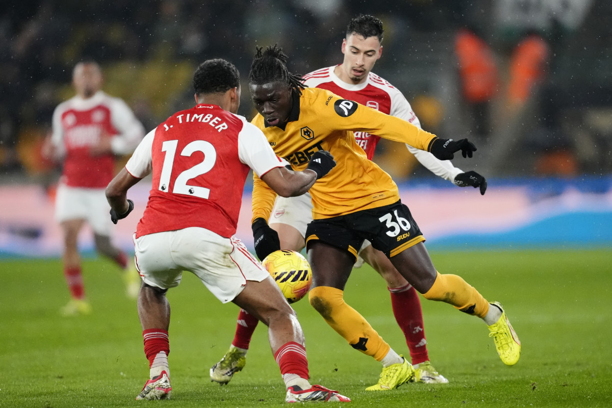 Wolves Mateus Mane and Arsenal’s Jurrien Timber battle for the ball