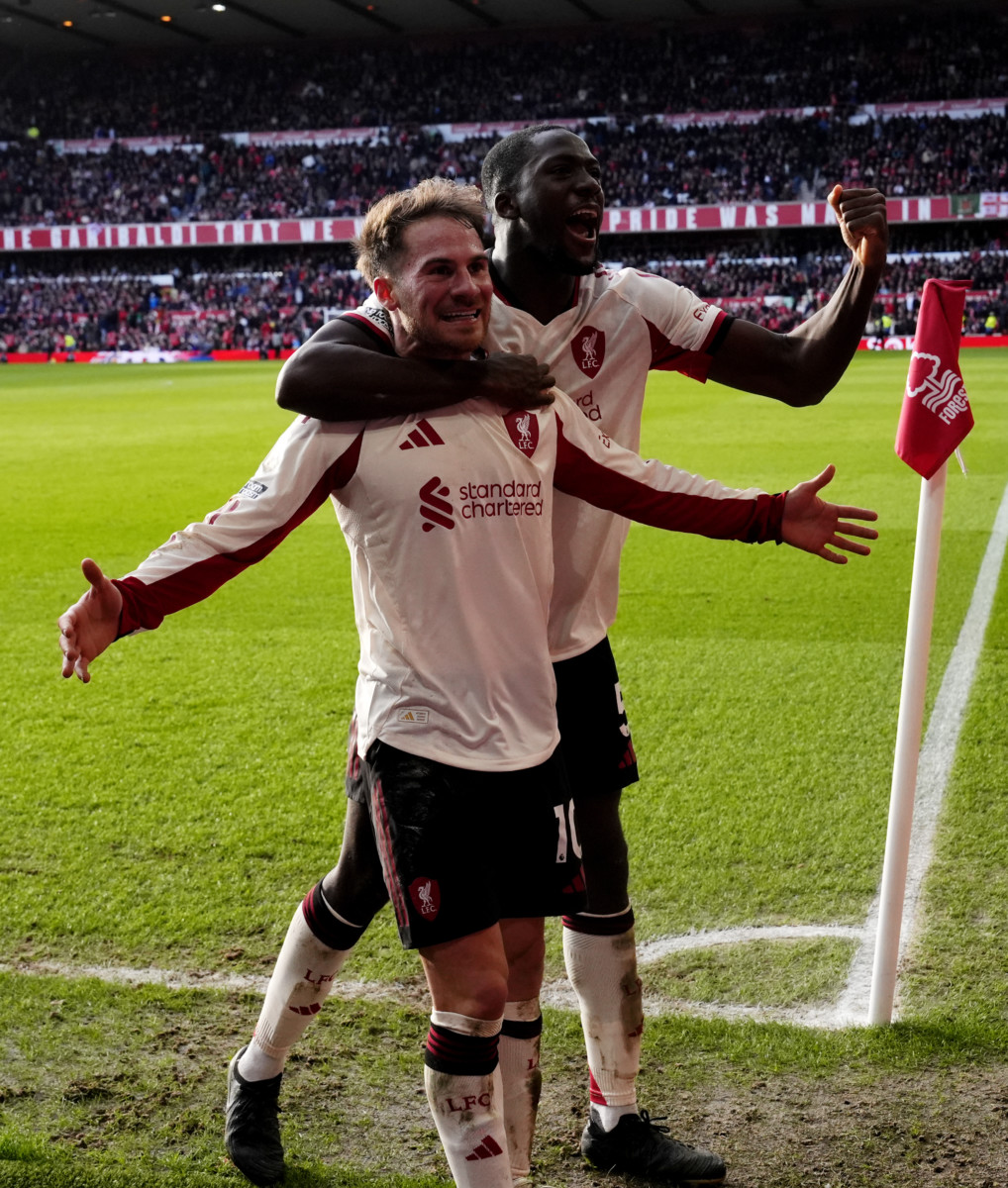 Liverpool’s Alexis Mac Allister, left, celebrates with Ibrahima Konate after his late winner