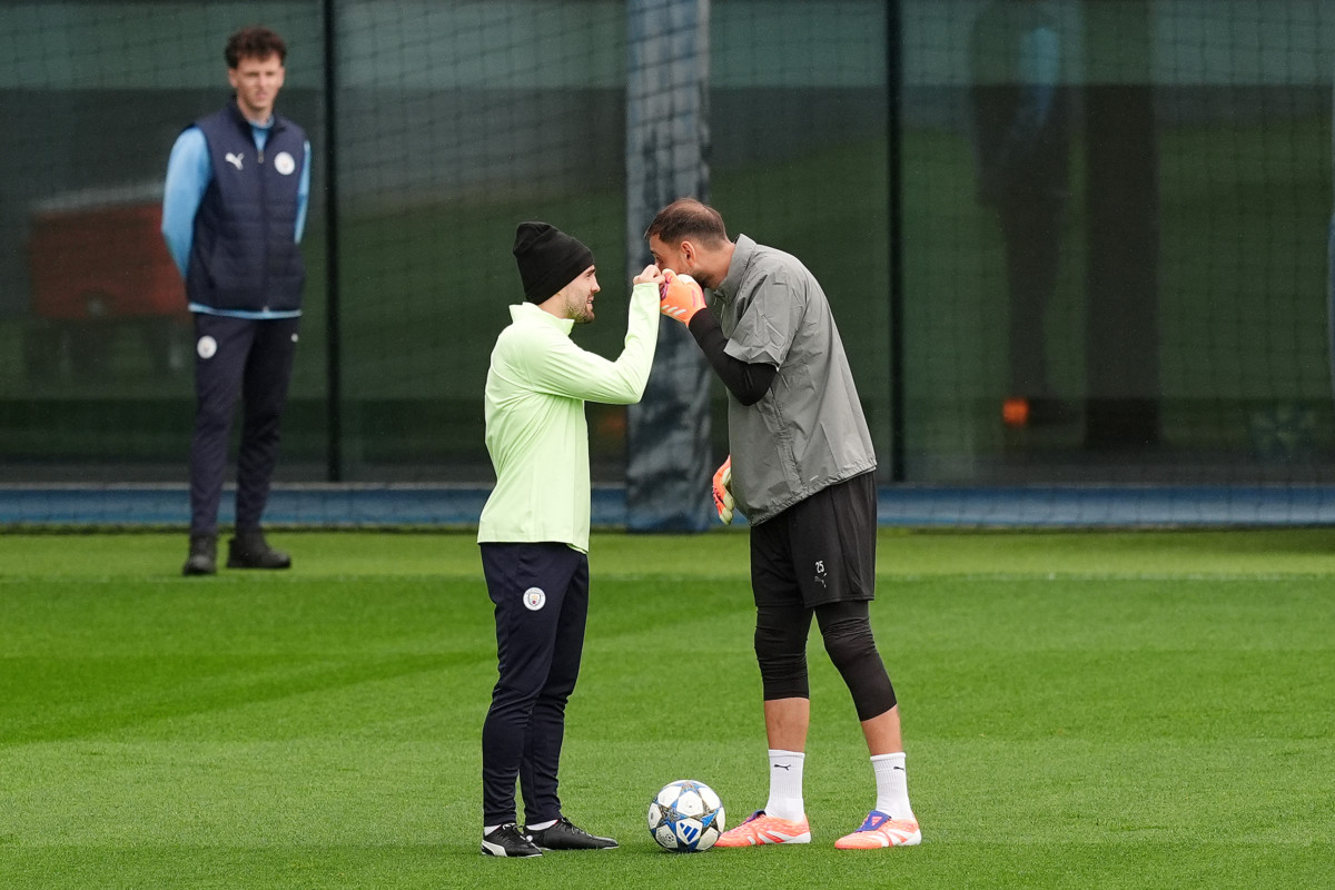 Manchester City’s Mateo Kovacic and goalkeeper Gianluigi Donnarumma (right) during a training session 