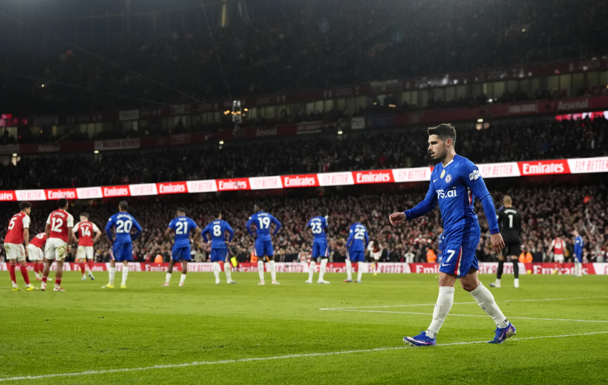 Chelsea’s Pedro Neto leaves the pitch after his red card against Arsenal