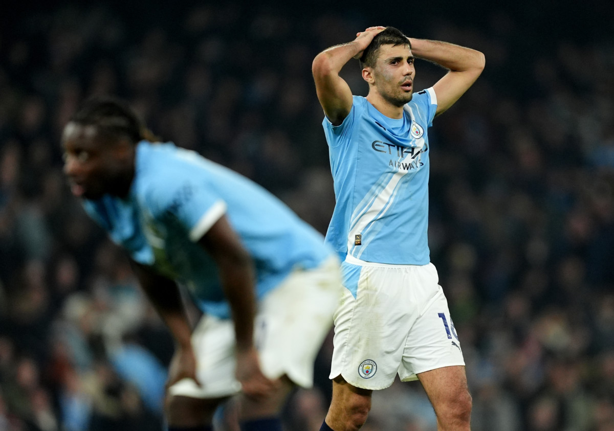 Manchester City’s Rodri (right) and Jeremy Doku (left) show their frustration after a draw against Nottingham Forest